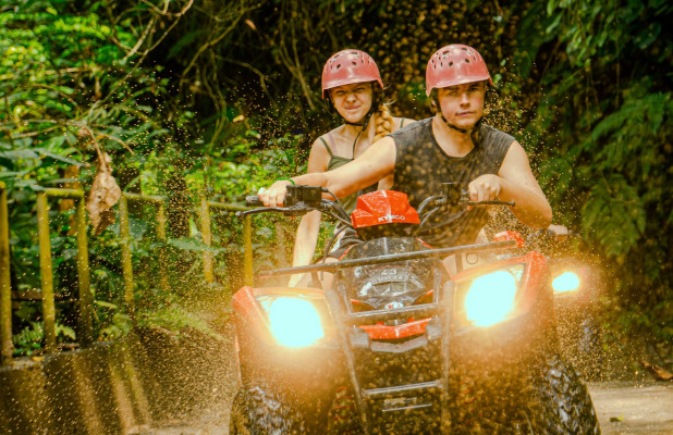 Kuber ATV Quad Bike Through Waterfall And Tunnel